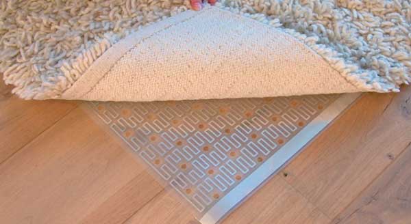 Vloerverwarming onder de vloerkleed